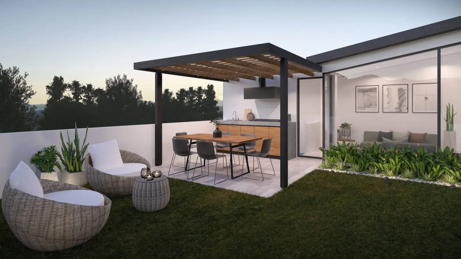 Aménagement de jardin avec une pergola adossée à une maison vue sur une cuisine d'été et quelques aménagements de paysages réalisés par DC PaYsage à Ars en Ré.